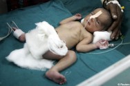 Newborn baby survives train toilet slip