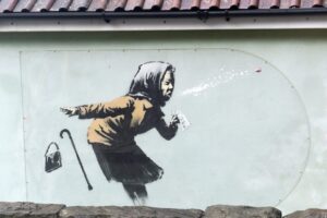 Banksy sneezing woman artwork appears on Bristol house
