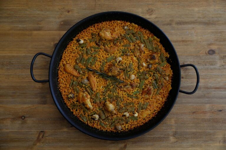 Ole! Spanish chef gives thumbs up to a robot-made paella