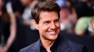 Tom Cruise signs football shirts for club fundraiser